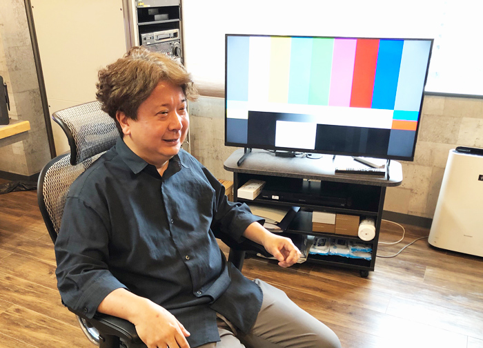 インタビューに答える北澤部長